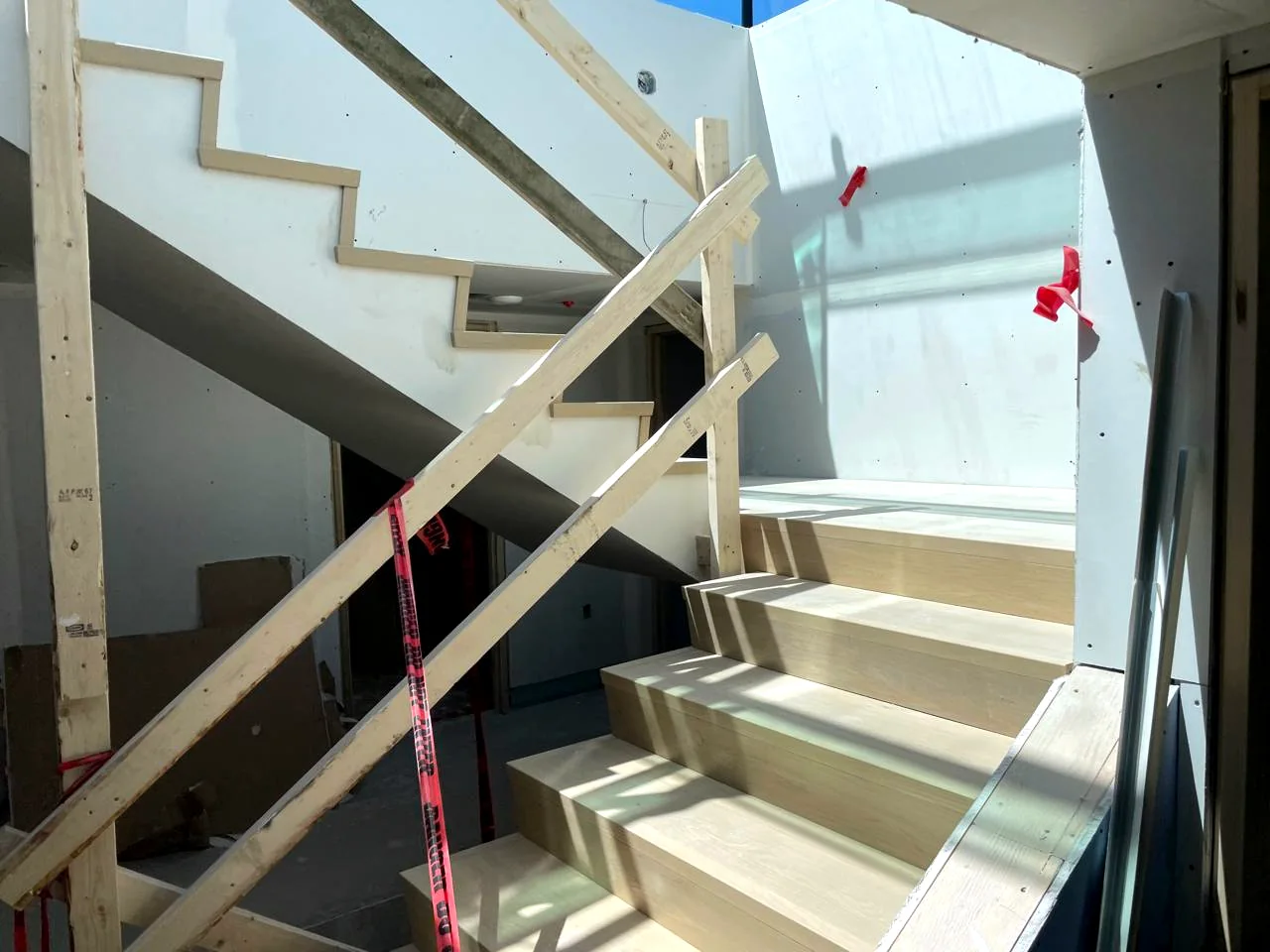 Hardwood stair and floor protection detail during installation